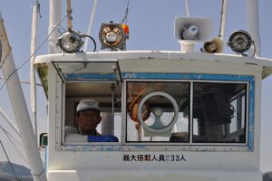 Ein Fischer von Minamisanriku auf Fischfang